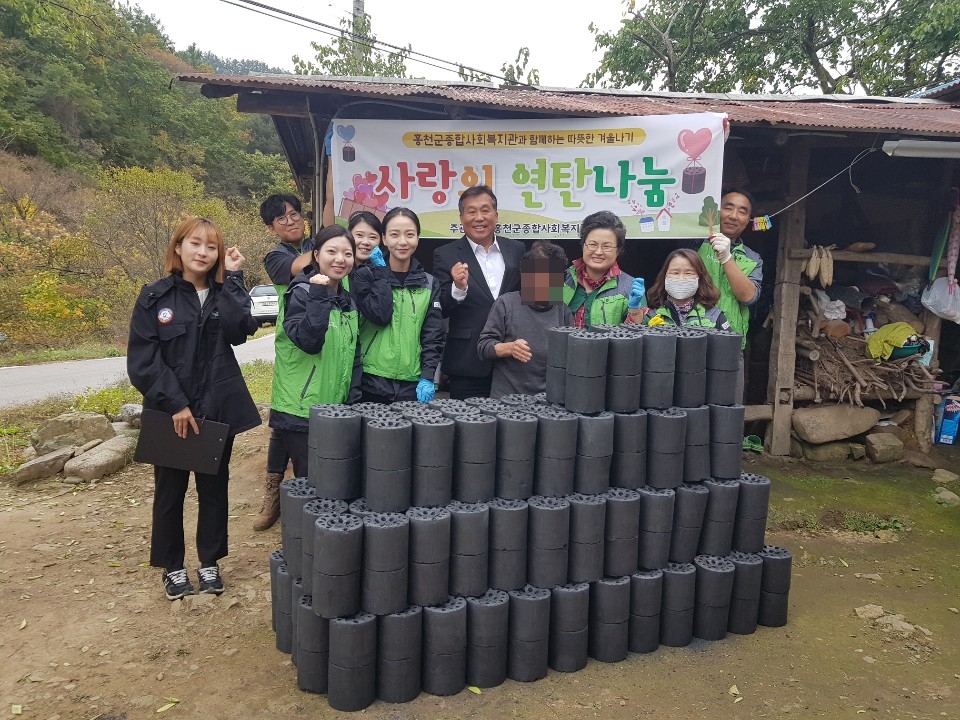 서석 연탄나눔 단체사진1(모자이크).jpg